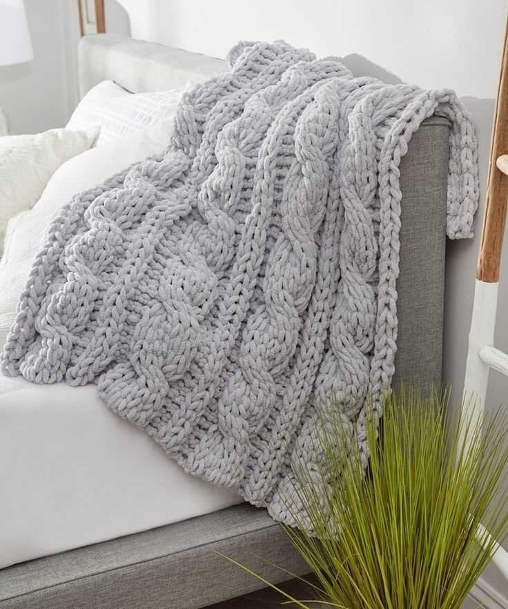 Create a Cozy Cable Knit Blanket with this Simple Pattern Easy cable knit blanket pattern