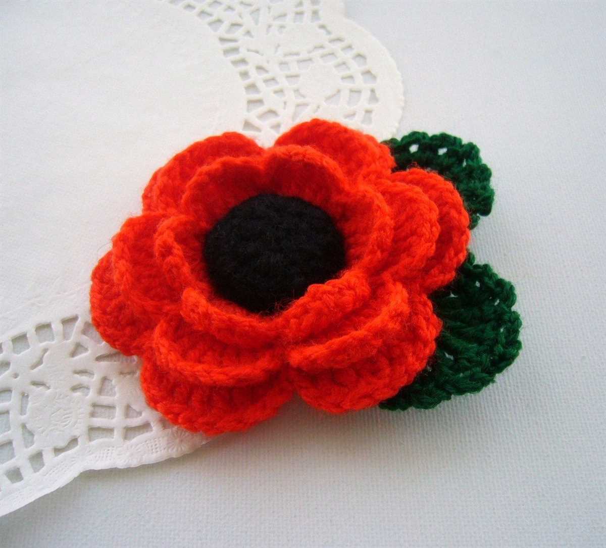 Knitting pattern for poppy brooch