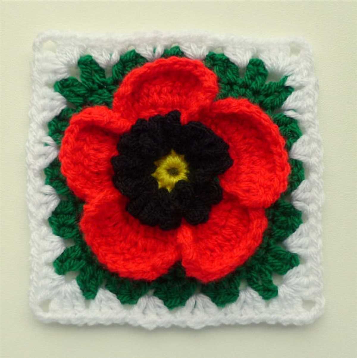 Knitting pattern for a poppy flower