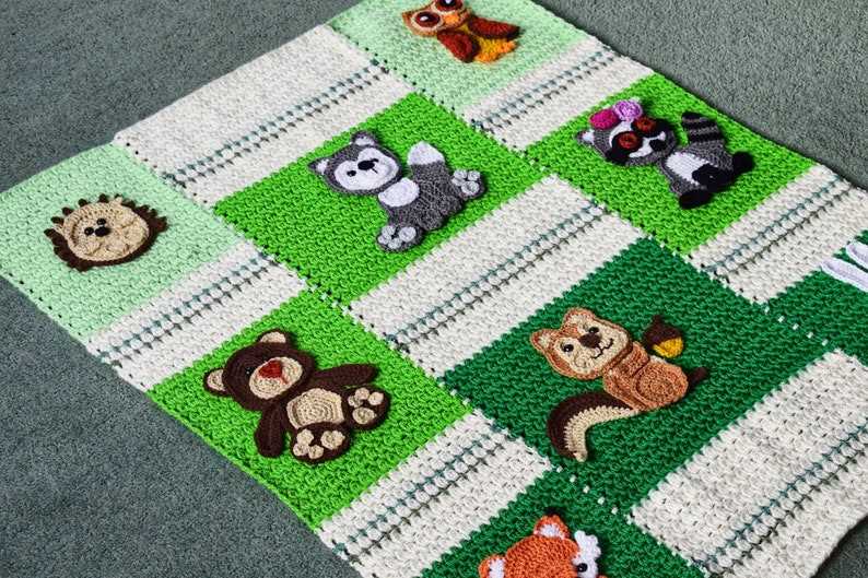 Free knitting patterns for baby blankets with animals