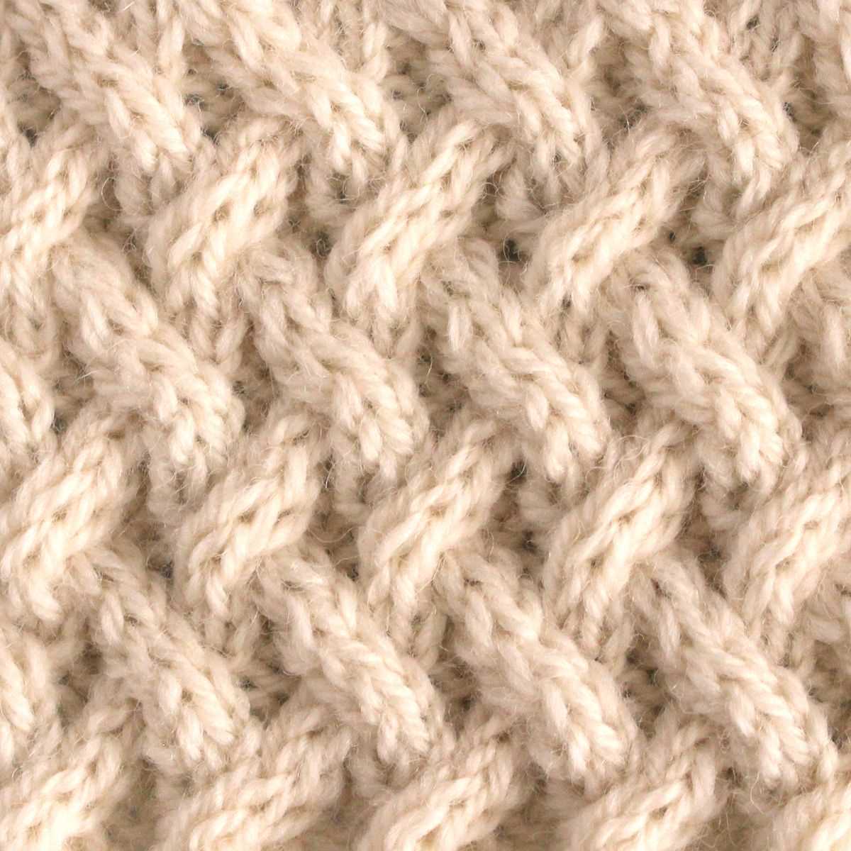 Woven cable knitting pattern
